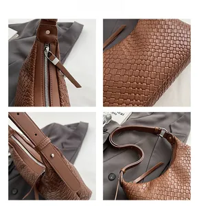 Dettagli della borsa hobo in pelle intrecciata marrone con trama a griglia e zip argento