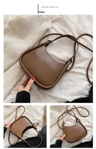 Detailed views of a brown crescent hobo bag made of smooth leather with circular buckle accents