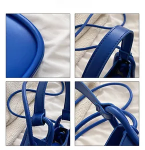 Detail shots of Klein blue shoulder bag showing stitching and leather texture