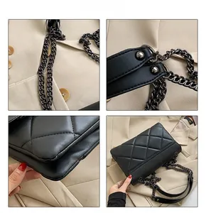 Detailed close-up of the quilted texture, metal chain strap and rivets on the black bag