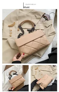 Detailed views of khaki quilted chain crossbody bag with gunmetal hardware and faux leather