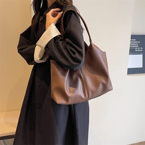 Large brown leather tote bag with pebble texture, stylish shoulder bag for women