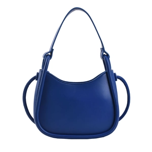 Minimalist French style deep blue leather crescent shoulder bag with round silhouette