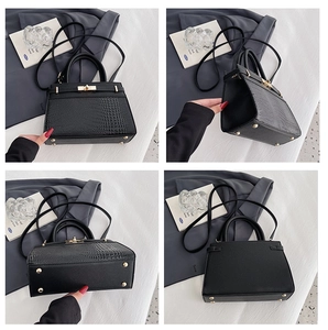 Four-angle macro views of black crocodile embossed faux leather bag with gold hardware
