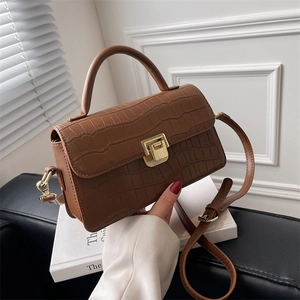Brown crocodile embossed leather square bag with vintage gold buckle and top handle