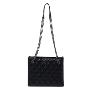 Classic black quilted shoulder bag with silver chain strap and metal pendant on white background