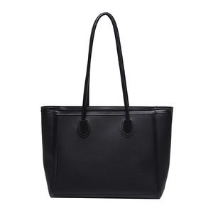 Classic black tote bag in lychee pattern leather with spacious minimalist design