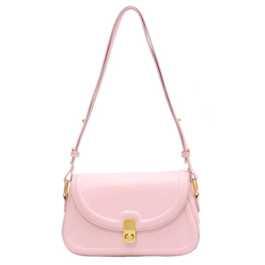 Minimalist light pink leather crossbody bag with elegant gold twist lock and shoulder strap