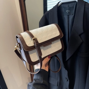 Fashionable quilted crossbody flap bag in cream and brown with gold hardware for women