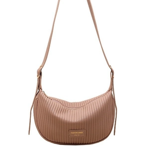 Chic pleated croissant shoulder bag in dusty rose with adjustable strap for women