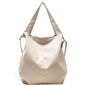 Minimalist beige PU leather tote bag with vertical stitching and wide top handles
