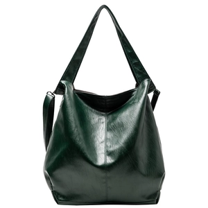 Large dark green faux leather tote bag with glossy finish and dual shoulder straps