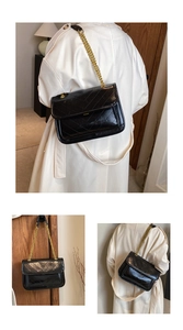 Three-way view of a black quilted leather chain bag with gold metal strap and V-pattern
