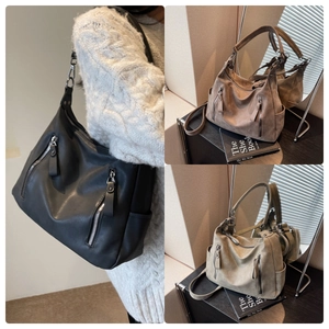 Large capacity hobo bag for women in black, brown, and green with zipper pockets