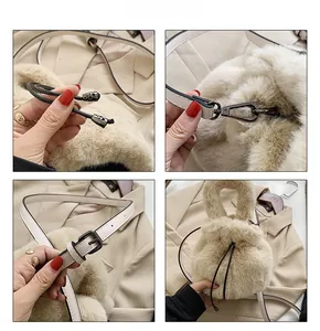 Detail view of beige plush bucket bag showing drawstring closure and metal hardware