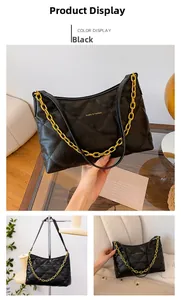 Detail of black quilted shoulder bag featuring gold chain and Sunita & Fashion logo