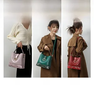 Three-way bucket bag showing handbag, crossbody, and shoulder styles in multi-texture leather