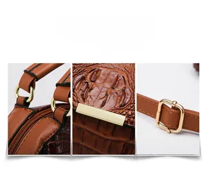 Close-up of brown crocodile texture leather bag with gold metal hardware and stitching