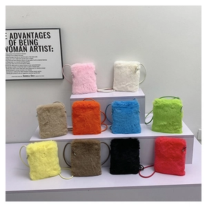 Detailed display of plush mobile phone bags in ten vibrant colors on a white display stand