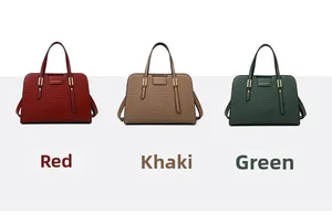 Detailed comparison of embossed crocodile pattern handbags in red, khaki, and green