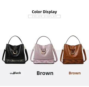 Three-color bucket bags featuring crocodile and snake patterns in black, pink, and brown