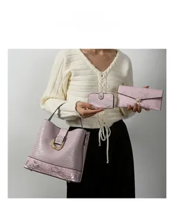 Pink faux crocodile leather handbag three-piece set with gold hardware and wallet accessories