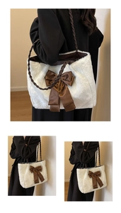 Detail showing plush white faux fur texture and large brown satin bow on tote bag