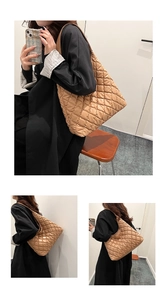 Detailed view of large quilted crossbody bag with stylish rhombic pattern and wide strap