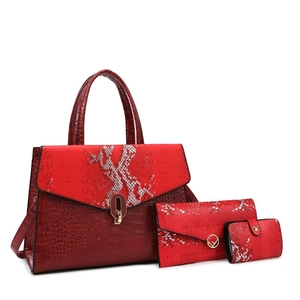 Three-piece red handbag set featuring embossed crocodile and snakeskin patterns