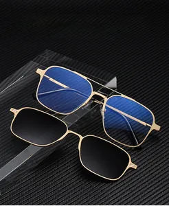 Detail of magnetic clip-on sunglasses with square metal frame and double bridge design