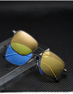 Detail of metal square frame glasses with yellow magnetic clip-on lenses for driving