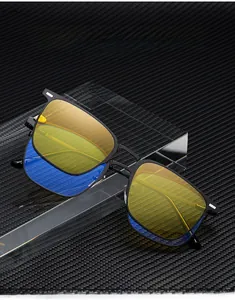 Macro shot of durable square black metal frame glasses with yellow anti-blue light lens
