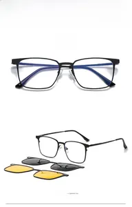 Detail of square frame magnetic clip-on sunglasses set with gray and yellow lenses