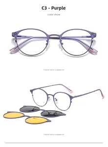 Close-up of purple round metal frames with magnetic polarized lenses and star hinges