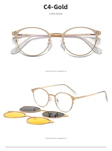 Detail of gold metal frame sunglasses with star hinge accents and magnetic clip-on lenses