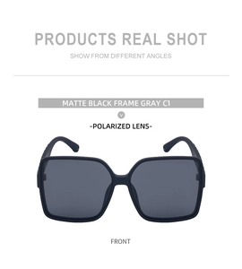 Front view of matte black polarized sunglasses with gray lenses and oversized frame
