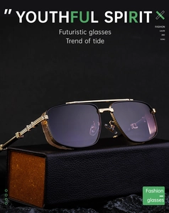 Detail of gold metal punk sunglasses with mesh hinge on black leather case