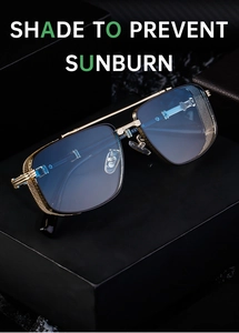 Detail view of steampunk sunglasses with gold metal frame and side mesh shield