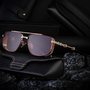 Punk style metal square sunglasses with gold frames and mesh side shields on a black case
