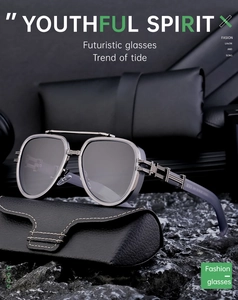 Detail of pilot sunglasses with hollow metal temples on a dark stone surface
