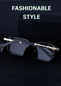 Close-up of steampunk sunglasses with black frames and three-segment gold metal hinges