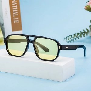 Square frame aviator sunglasses with black thick frames and yellow tinted lenses for men