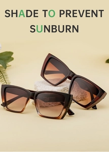 Macro view of square sunglasses featuring side diamond-patterned temples and tinted lenses