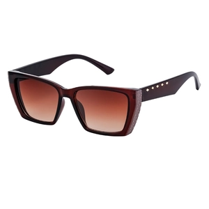 Fashionable cat eye sunglasses in dark wine red with golden diamond studs and gradient lenses