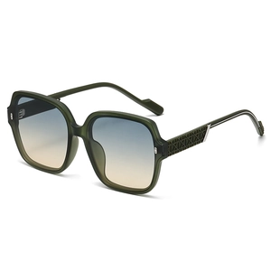 Green matte oversized square sunglasses with gradient lenses and textured temples