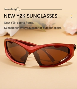 Close-up of Y2K wraparound sports sunglasses in glossy wine red frame with brown lenses