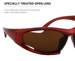 Detail of red sporty Y2K sunglasses featuring open lenses to reduce wind resistance