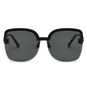 Modern semi-rimless polarized sunglasses for women with square black and metal frames
