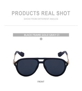 Front view of vintage aviator sunglasses with black frame and gold arrow rivet details