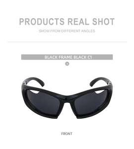 Front view of Y2K wraparound sports sunglasses with sleek black frame and dark lenses
